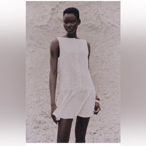 Elegant Cream Sleeveless Dress